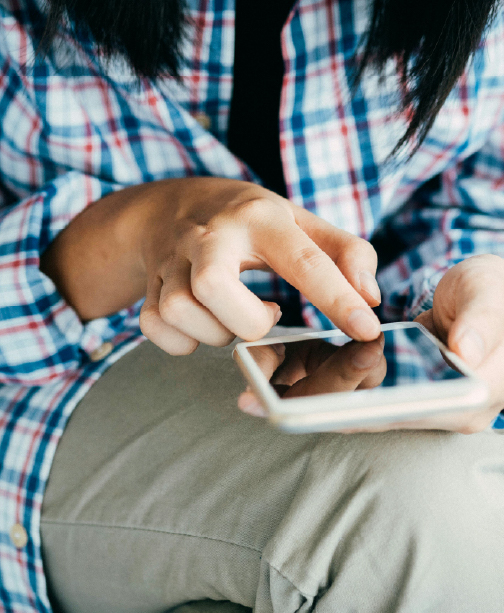 Person making mobile payment on phone