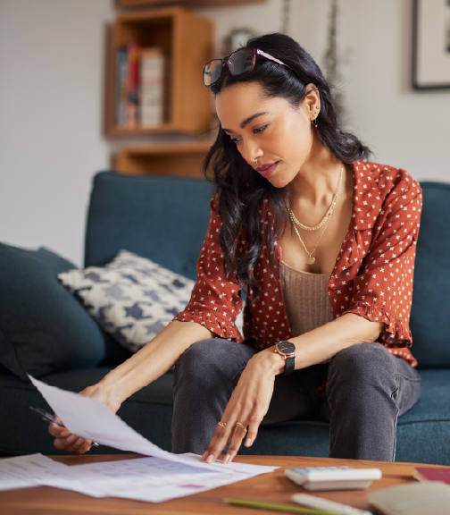 Woman using laptop at home