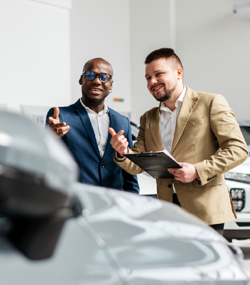 Business professionals communicating by car