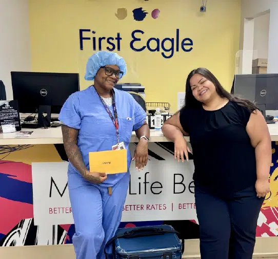 Staff posing inside First Eagle branch