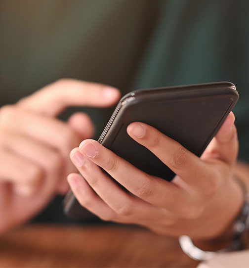Close up of person using smartphone